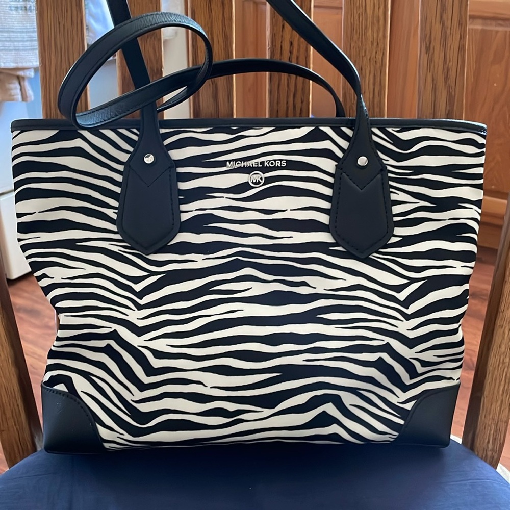 A Michael Kors never been used zebra print for animal print lovers